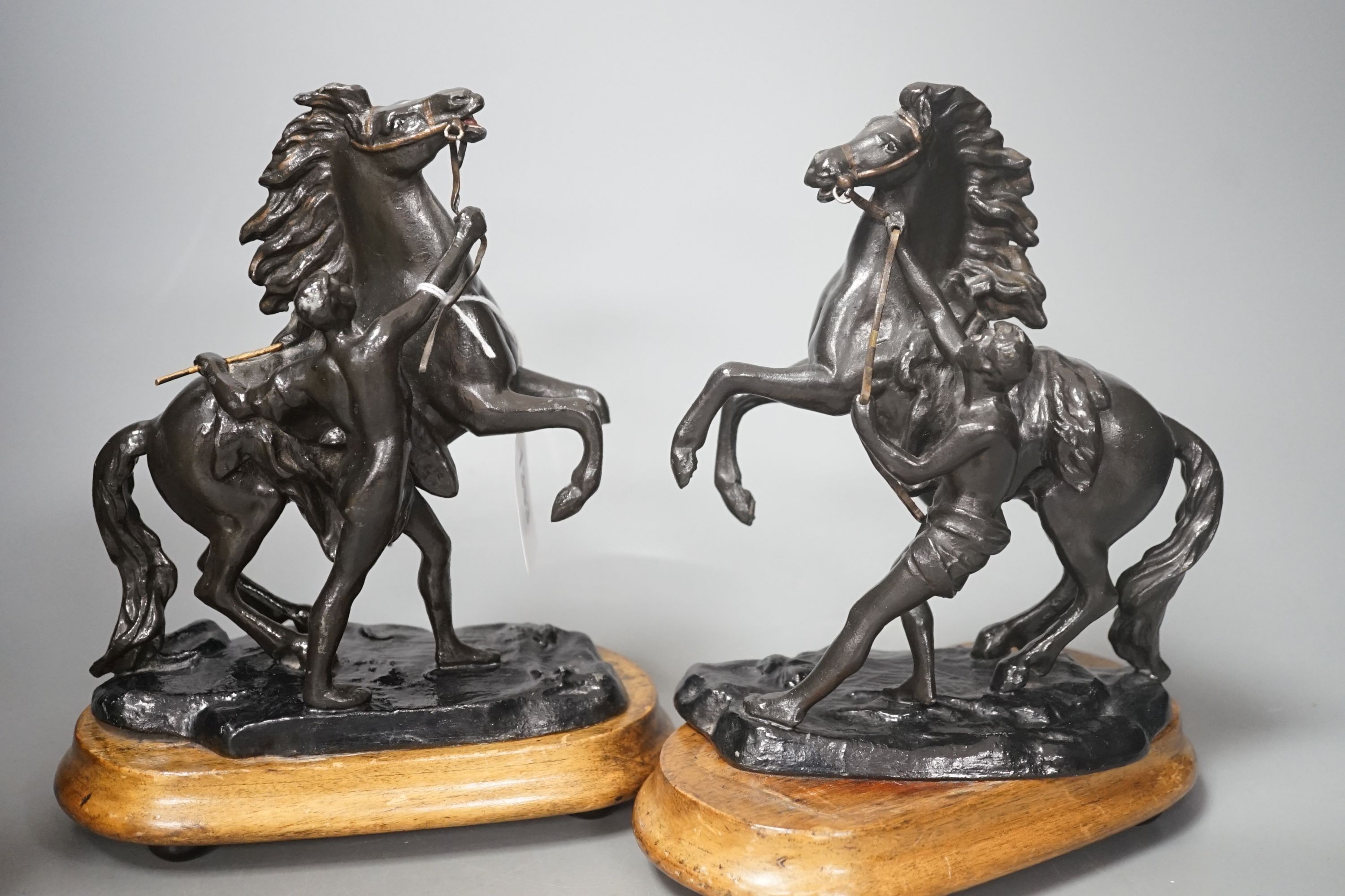 A small pair of painted spelter Marly horses and a pair of Austrian ceramic vases, tallest 23cm